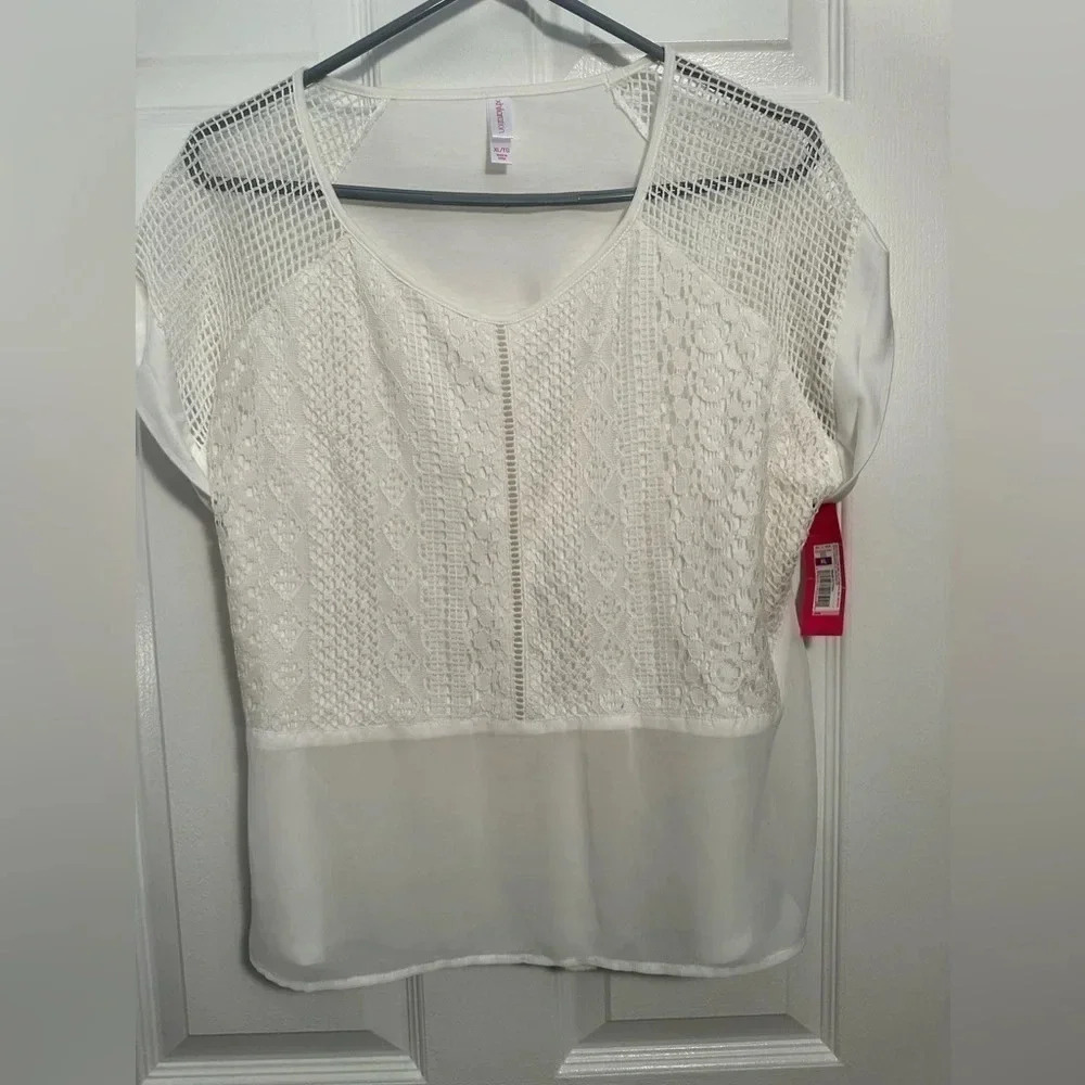 White lace and sheer sleeveless top